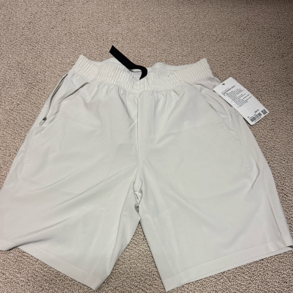BNWT MENS SIZE M PACE BREAKERS 9” BONE